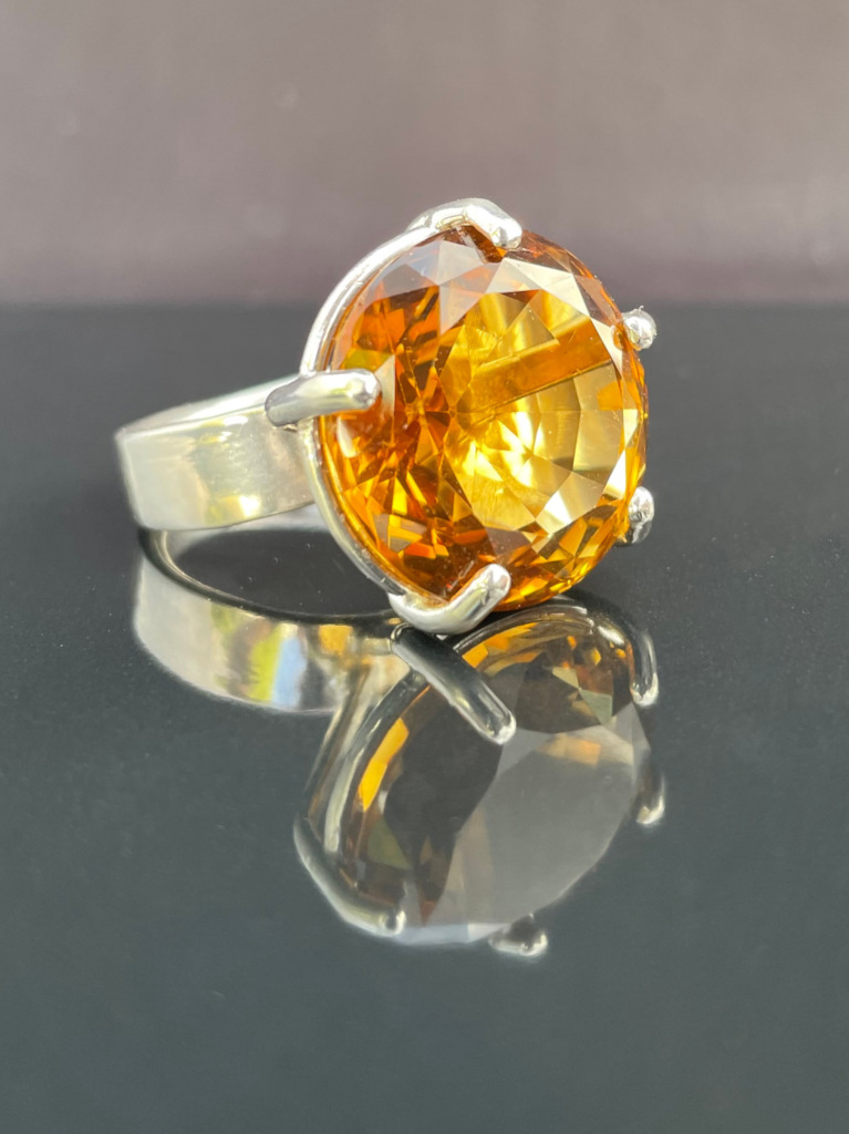statement-citrine-ring-767.jpg**Giant citrine dress ring**Sterling silver claw set dress ring, presenting a fancy cut faceted citrine, around 1 inch diameter - hallmarked**0**0 	**0******